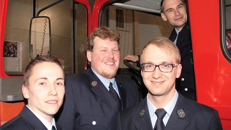 Sie führen die Seinsheimer Feuerwehr: Martin Dorsch, Florian Bergmann, Kommandant Stefan Düll und Michael Zepmeisel (oben).Fotos: G. Bauer