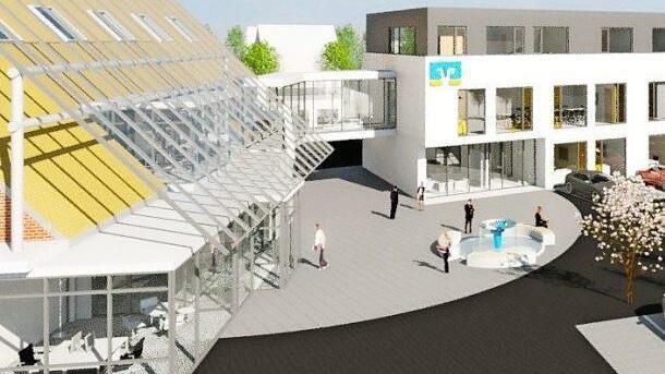 Die Hauptstelle der Raiffeisenbank Altenkunstadt muss aus Platzgründen erweitert werden. Der Altbau (links) wird über eine Verbindungsbrücke mit dem dreigeschossigen Neubau verbunden. Im August oder September dieses Jahres soll der Spatenstich für die 3,6 Millionen Euro teure Baumaßnahme erfolgen.  Fotos: Stephan Stöckel