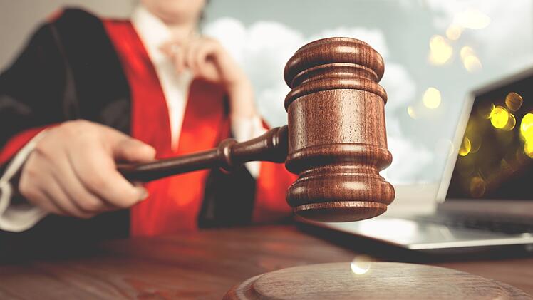 Man holds gavel judge with lawyer
