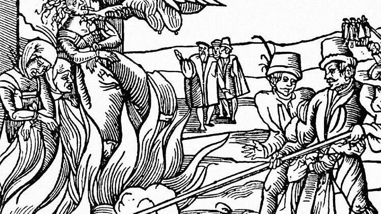 Der zeitgenössische Stich zeigt die Hexenverbrennung zu Dernburg im Jahre 1555. Der Hexenwahn in Europa erreichte vor 400 Jahren einen traurigen Höhepunkt  Foto: dpa
