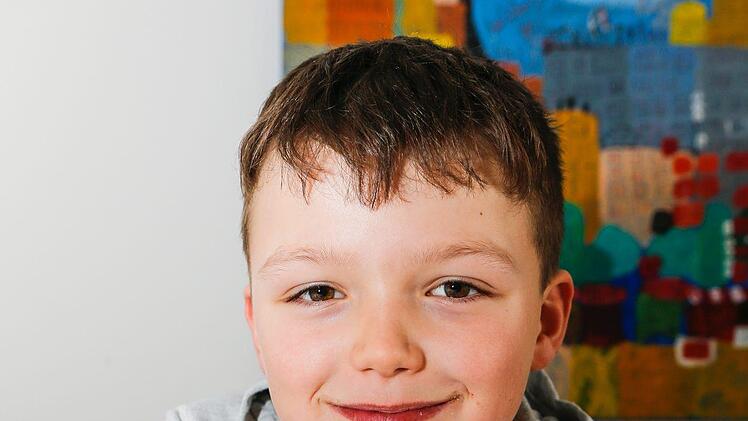 Niklas (9)  aus Mühlendorf : " Ich mag  die Popel-Comics. Am liebsten mag ich Blecheimer. Der ist so witzig!  Im Kurs habe ich auch einen Roboter gezeichnet, der ist schön geworden."  Foto: Matthias Hoch