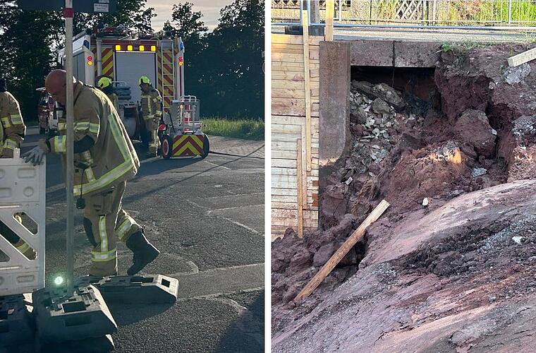Feuerwehr Bubenreuth sichert Gefahrenstelle ab - Straße geflutet