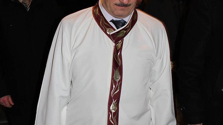 Imam Osman Harbi betritt das evangelische Gotteshaus. Foto: Manja von Nida