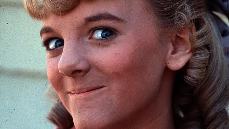 Der freche, herausfordernde Blick t&auml;uscht nicht: Nellie Oleson (Alison Arngrim) hat es faustdick hinter den Ohren.