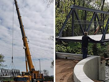 Pettstadt: Großer Kran bringt neue Brücke in Position - zweiter Bürgermeister testet Standsicherheit