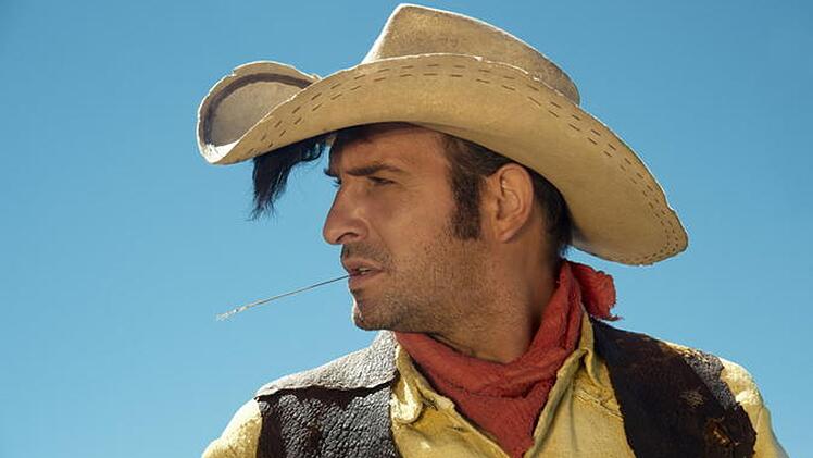 Revolverheld mit Haartolle: 2009 spielte der sp&auml;tere Oscar-Gewinner Jean Dujardin Lucky Luke in der gleichnamigen Westernparodie herrlich &uuml;berdreht.