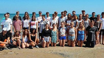 Sonne tanken und Andacht am Strand