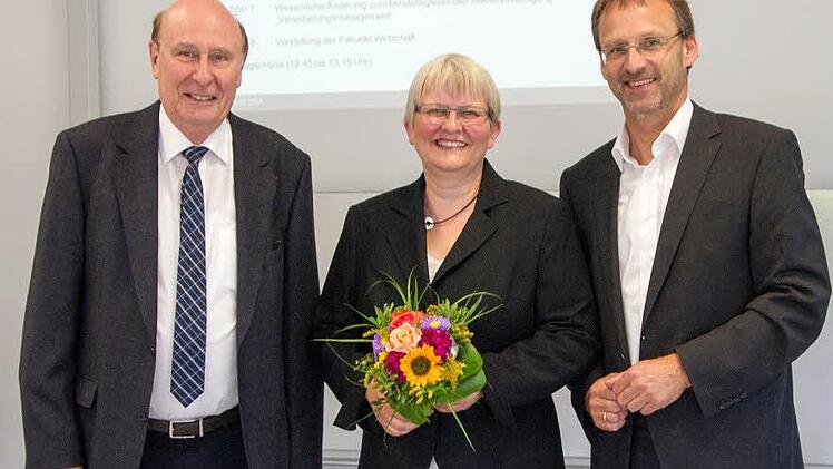 Von links: Professor Jürgen van der List, Vorsitzender des Hochschulrats, Professorin Jutta Michel und Hochschulpräsident Professor Michael Pötzl.