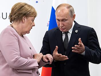 Kanzlerin Angela Merkel und Russlands Pr&auml;sident Wladimir Putin
