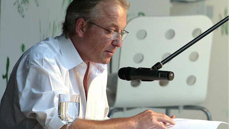 Peter Braun während einer Lesung  Foto: Erich Weiß