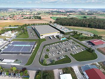 Die Visualisierung des Bauträgers zeigt das geplante Amazon-Gebäude im Gewerbegebiet Limbach.  Das Gebäude vorne links mit dem blauen Streifen auf dem Dach existiert bereits. Es gehört nicht zu Amazon, sondern darin ist die Firma Hofmann zuhause.Visualisierung: P3 Logistic Parks