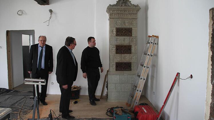 Mit einem Kachelofen wird es gleich noch etwas gemütlicher.