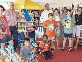 Mit Urlaubslektüre können sich die Mitglieder des Sommerferien-Leseclubs in der Stadtbücherei eindecken.  Foto: Marion Eckert