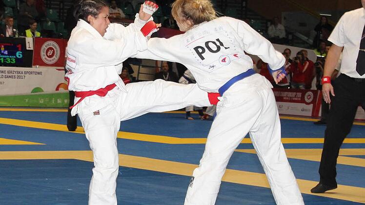 Die Neu-Staffelsteinerin Pia van Thurenhout setzt einen Fußstoß im Kampf um Bronze an. Am Ende musste sich die TSV-Kämpferin aber mit Rang 5 zufrieden geben. Foto: pr