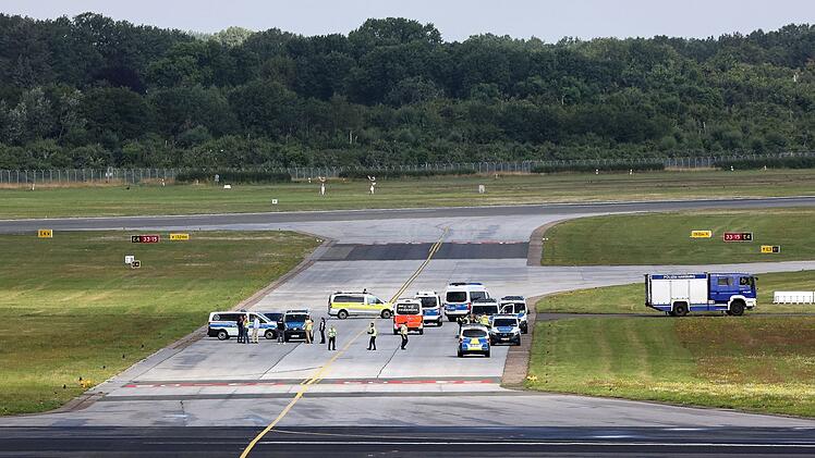 Aktion Letzte Generation am Flughafen Hamburg