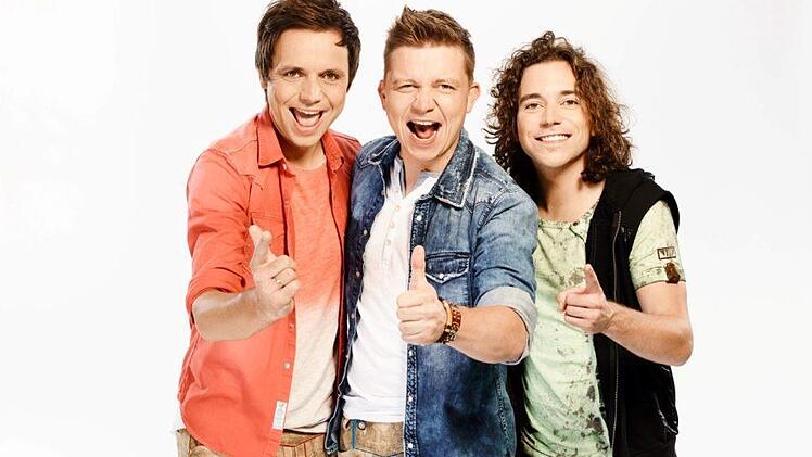 Erfolgreich und in Franken daheim: Markus (v.l.), Tobias und Philipp Thomann von der Band "Dorfrocker" Foto: Kuehmstedt