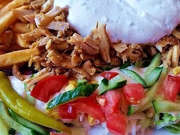 Viele Döner-Läden bieten besondere Extras für die Füllung an.