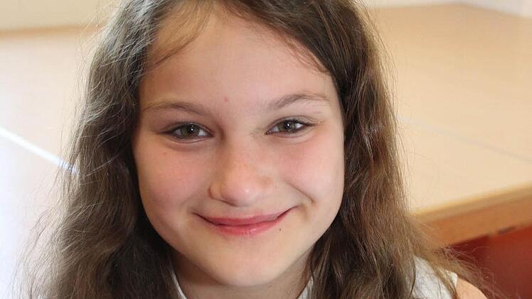 Antonia Schüssler ist mit zwölf Jahren die Jüngste im Chor. Foto: Sonny Adam