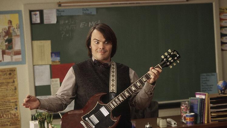 F&uuml;r Dewey (Jack Black) gibt es nur eine Sache, die wichtig ist: Rockmusik! Eines Tages landet er als Aushilfslehrer an einer Eliteschule ...
