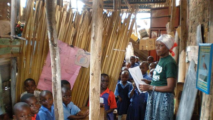 So sah es vor der Renovierung in der JJ. Nursery School in Kampala aus. Lehrerin Justine unterrichtete ihre Schüler in sehr beengten Verhältnissen. Schraudt