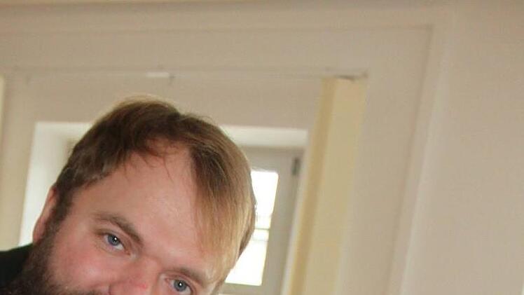 Christoph Hübner in seinem Büro im Lichtenfelser Forstamt Foto: Popp