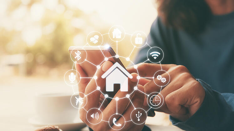 Smart home control with Smartphone,Lifestyle of person in modern life internet of things, Smart house technology.The new innovation of the Future.