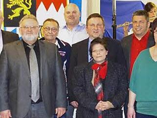 Vereinsehrungen bei der Rennsteigkapelle Kleintettau. Das Bild zeigt die Geehrten mit der Vorsitzenden Friederike Trautschold (rechts) sowie (von links) stellvertretenden NBMB-Bezirksvorsitzenden Thomas Kolb, NBMB-Kreisvorsitzenden Wolfgang Müller und Tettaus Bürgermeister Peter Ebertsch.