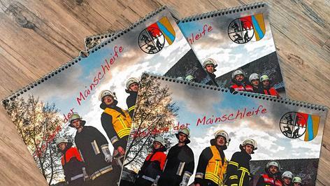 &bdquo;Helden der Mainschleife&ldquo; posen für den guten Zweck