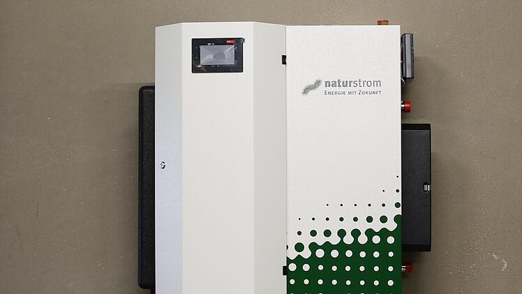 Die Wärmeübergabestation überträgt die Wärme vom Netz auf das jeweilige hausinterne Heizungssystem. Foto: Naturstrom AG