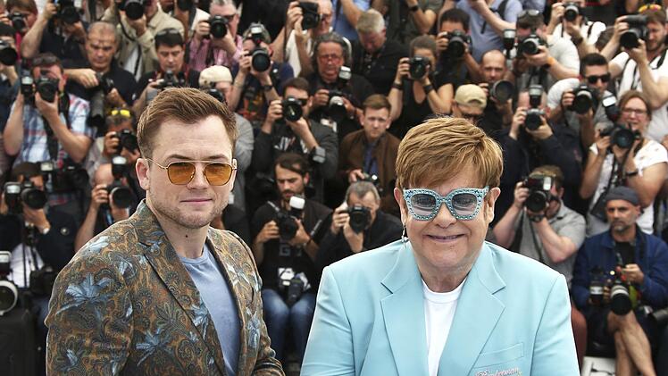 Taron Egerton (links und Elton John bei einem Fototermin für "Rocketman" beim Filmfestival von Cannes. Joel C Ryan/Invision/AP/dpa