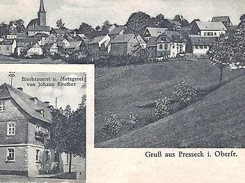 1920 schickte man diese Ansichtskarte von Presseck in die weite Welt. Das Anwesen der Bierbrauerei und Metzgerei von Johann Reuther wurde dabei besonders herausgehoben. Das Gebäude wurde 1969 abgerissen. Repro: Siegfried Sesselmann