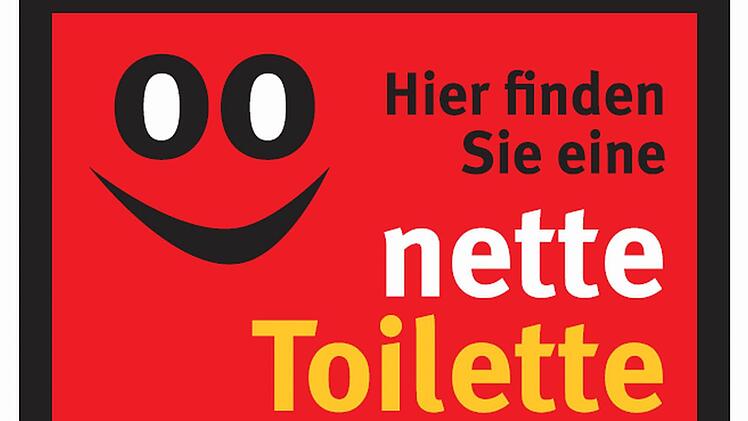Dieses Schild weist auf die "netten Toiletten" hin.