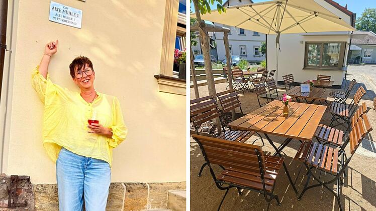 Eine Person in gelber Bluse steht l&auml;chelnd vor einem Geb&auml;ude. Daneben ein einladender Au&szlig;enbereich eines Caf&eacute;s mit Holztischen und Sonnenschirm.