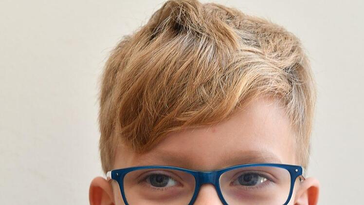 Josua (8) aus Forchheim ist durch seinen Papa zur Bamberger Kinder-Uni gekommen: "Er hat mir den Flyer gezeigt und ich fand das toll. " Foto: Ronald Rinklef