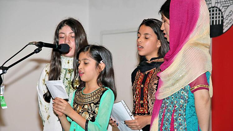 Bewohner der Gemeinschaftsunterkunft stellten sich in der Alten Aula vor.  Foto: Dieter Britz