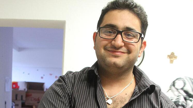 Ali Al Jirudi bewahrt in der Küche den Überblick -  selbst in der größten Hektik. Foto: Sonny Adam