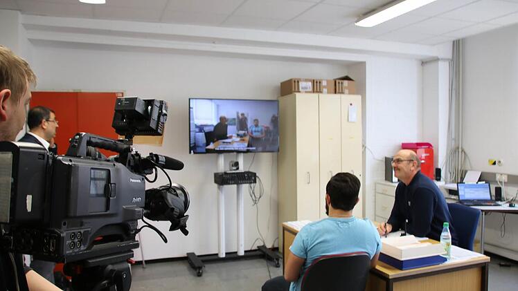Eindrücke der nachgestellten telemedizinischen Sitzung. Foto: Ralf Ruppert