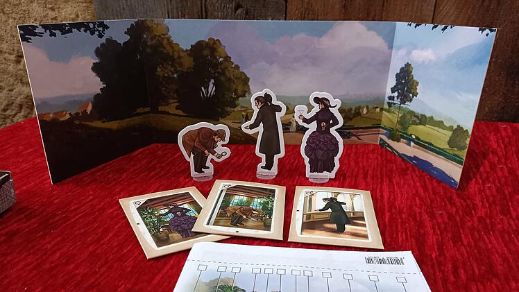 Spiele-Test "Der Perfekte Moment - Die Sherlock-Erweiterung": Fotopuzzle mit Krimi-Story
