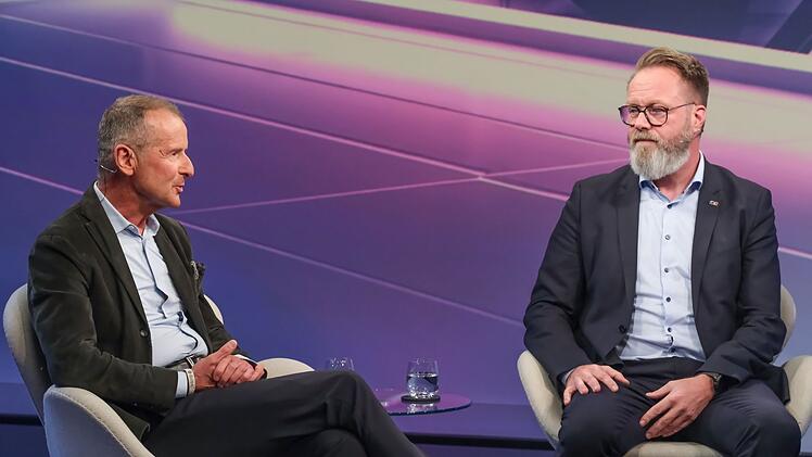 Herbert Diess (links) und Claus Ruhe Madsen sind sich einig, dass Deutschland innovationsfreundlicher werden m&uuml;sse.