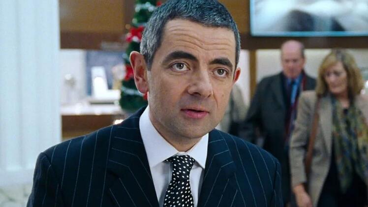Der Deko-begeisterte Ladenangestellte Rufus (Rowan Atkinson) hat zwar nur einen kleinen, daf&uuml;r umso denkw&uuml;rdigeren Auftritt.