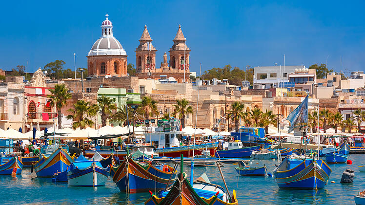 Taditional eyed boats Luzzu in Marsaxlokk, Malta