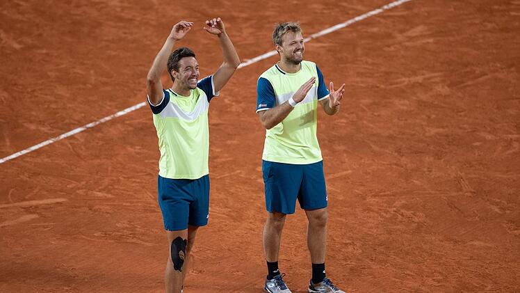 Platz 2: Zwei Mal Erster ergibt Platz 2: Der Coburger Kevin Krawietz (r.) und Andi Mies wehrten auf dem Weg zur Titelverteidigung bei den French Open Matchbälle ab.J. Hasenkopfund