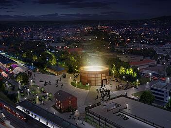 So k&ouml;nnte die Interimsspielst&auml;tte f&uuml;rs Coburger Landestheater aussehen: ein schicker Rundbau am G&uuml;terbahnhof, der auch anschlie&szlig;end genutzt werden kann. Zu den Bef&uuml;rwortern z&auml;hlen allen voran der Stadtrat Ren&eacute; H&auml;hnlein (SBC) und der Unternehmer Michael Stoschek. Aber ist dieses ehrgeizige Projekt tats&auml;chlich realsierbar?Grafik: Isabell Stengel/Anders Macht