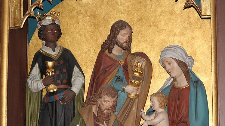 Auf dem gotischen Altarbild von der Anbetung durch die Könige in der Pfarrkirche von Ebern darf der Mohr nicht fehlen.  Foto: Eckehard Kiesewetter