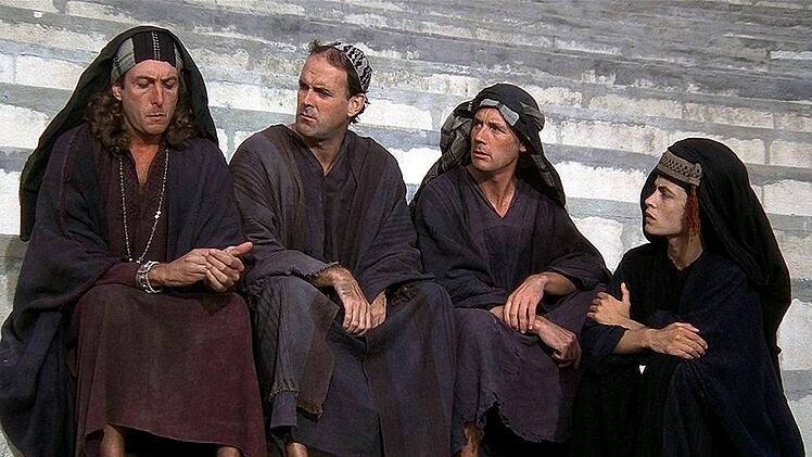Die Volksfront von Jud&auml;a - von links: Eric Idle, John Cleese, Michael Palin, Sue Jones-Davies - diskutiert &uuml;ber "Vergeltungsaktionen" gegen die R&ouml;mer.