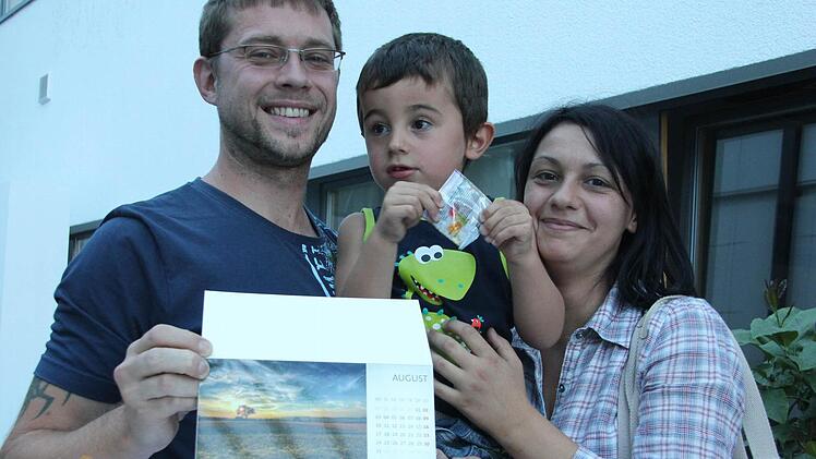 Andre Emrich und Familie mit Sigerbild Foto: Lena Alt