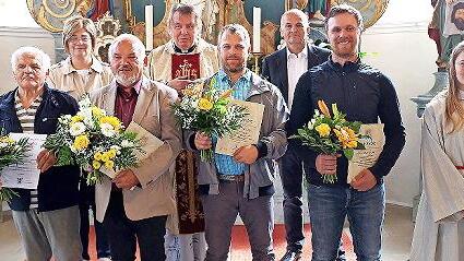 Der scheidende Pfarrgemeinderat (von links): Horst Scholz (knapp 50 Jahre), Herbert Mahr (zwölf Jahre), Ralf Kraus und Frank Weiß (je vier Jahre)