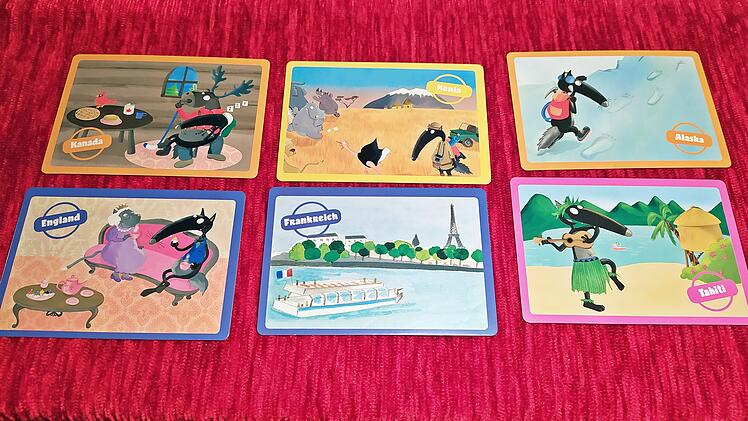Reise um die Welt mit Wolf - Rezension des Postkarten-Brettspiels für Kinder