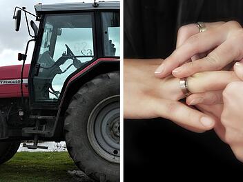 Brautpaar f&auml;llt bei Hochzeitsfoto in Mainbernheim aus Traktorschaufel