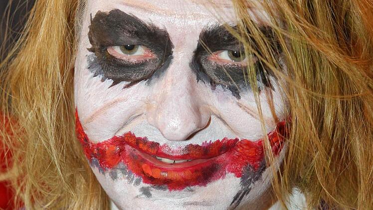 Alexander Dobrindt als Joker aus Batman (2010). Foto: Daniel Karmann, dpa